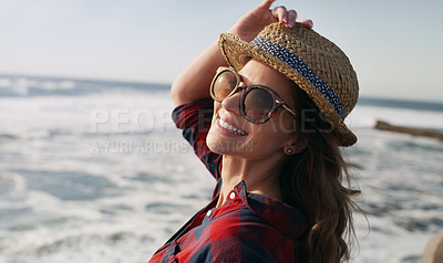 Buy stock photo Cropped shot of a beautiful woman enjoying herself at the beach