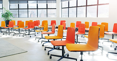 Buy stock photo Shot of chairs in an an empty modern office