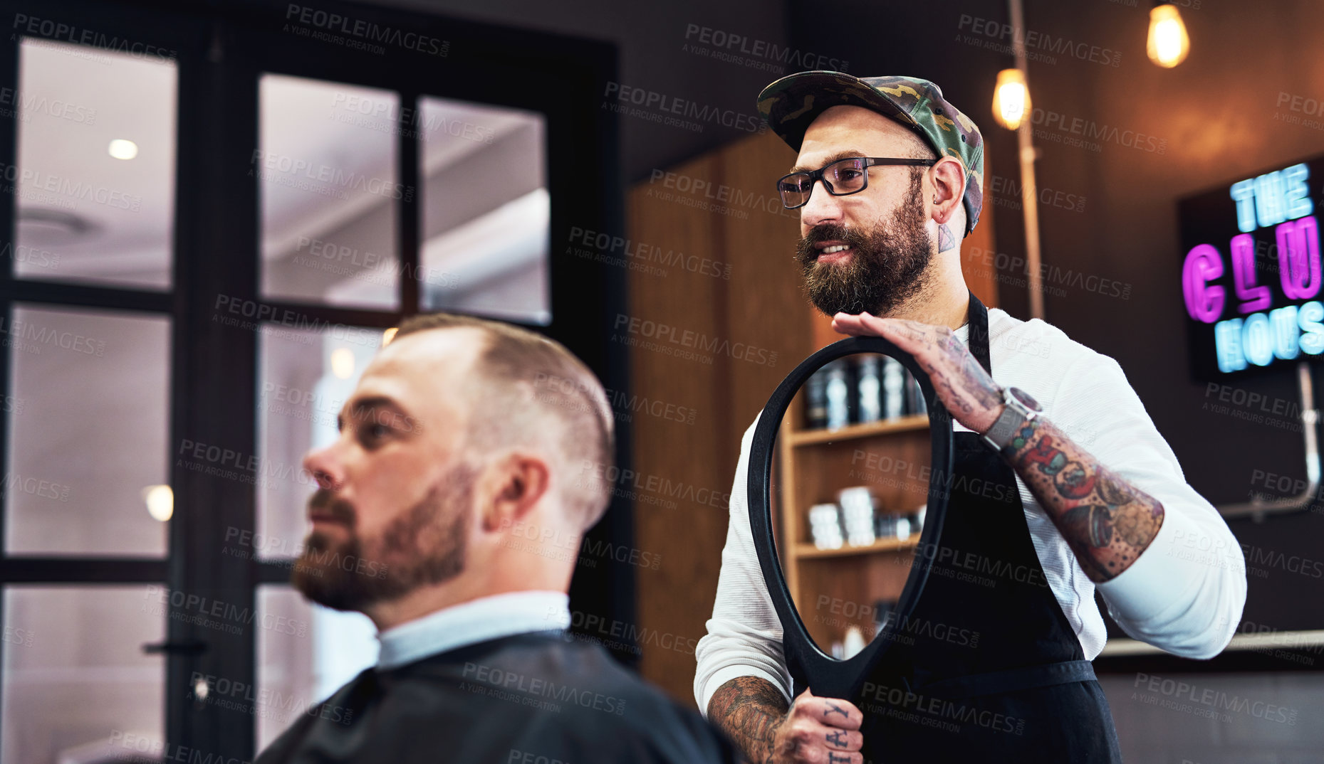 Buy stock photo Mirror, showing and man in barbershop with client, cut and tools for trendy hairstyle at small business. Style, barber and customer in chair for grooming service, creative haircut and clean trim.