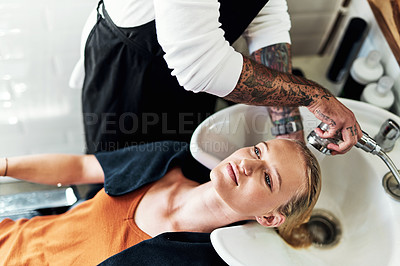 Buy stock photo Salon, beauty and woman client washing by basin for shampoo, makeover or grooming service. Above, luxury and hairstylist with customer for cleaning, hair care or hairdresser treatment in boutique