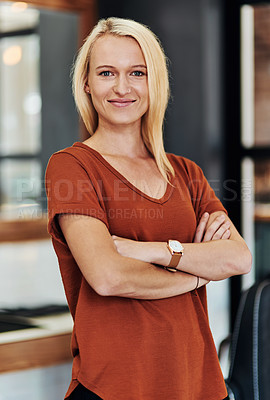 Buy stock photo Portrait of an attractive young hairdresser posing with her arms folded inside her salon