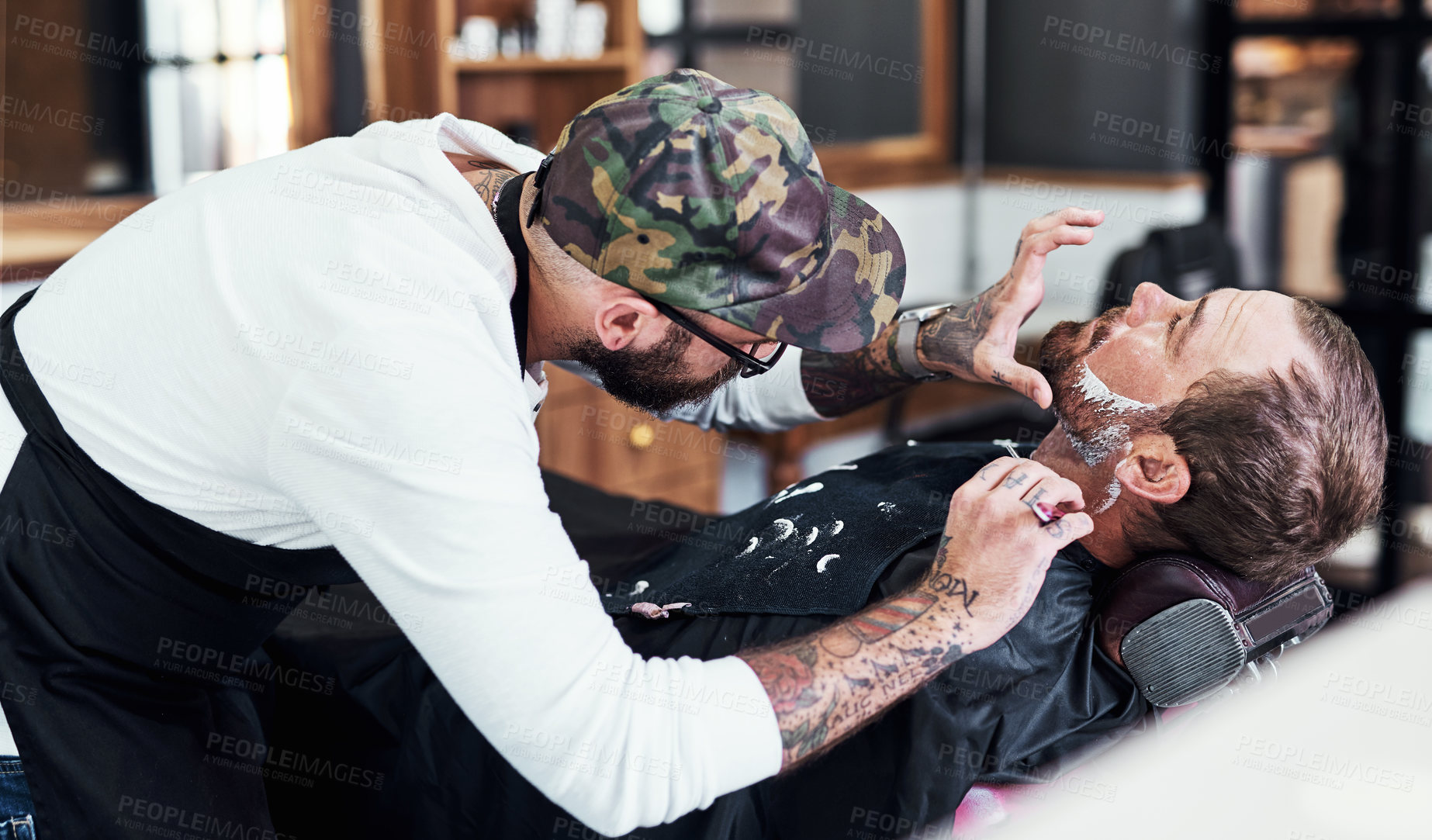 Buy stock photo Beard, razor and barber with man for shave, haircut and grooming for hygiene, wellness or cosmetics. Barbershop, hairdresser parlor and person with shaving cream, foam and blade for hair service