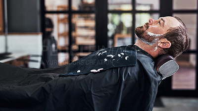 Buy stock photo Man, customer and beard care in barbershop, wash and trim or neat facial line up for client in all purpose chair. Appointment, maintenance and fresh cut with male person, wellness and relaxing