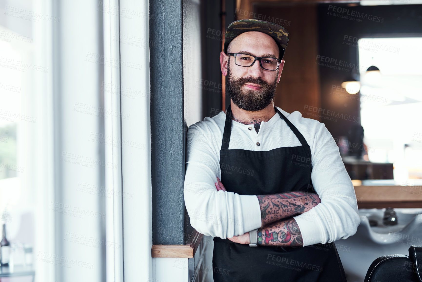 Buy stock photo Barber, crossed arms and portrait of man for hair grooming, wellness and beard service. Small business, professional and person in barbershop, hairdresser and parlor for haircare, career or styling