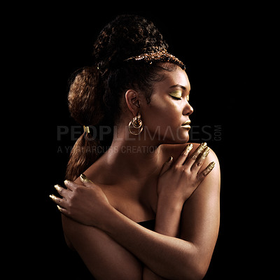 Buy stock photo Black woman, beauty and creative in studio with gold, jewellery and aesthetic on black background. Glitter, makeup and female model for luxury cosmetics, designer and rich fantasy for cosplay.