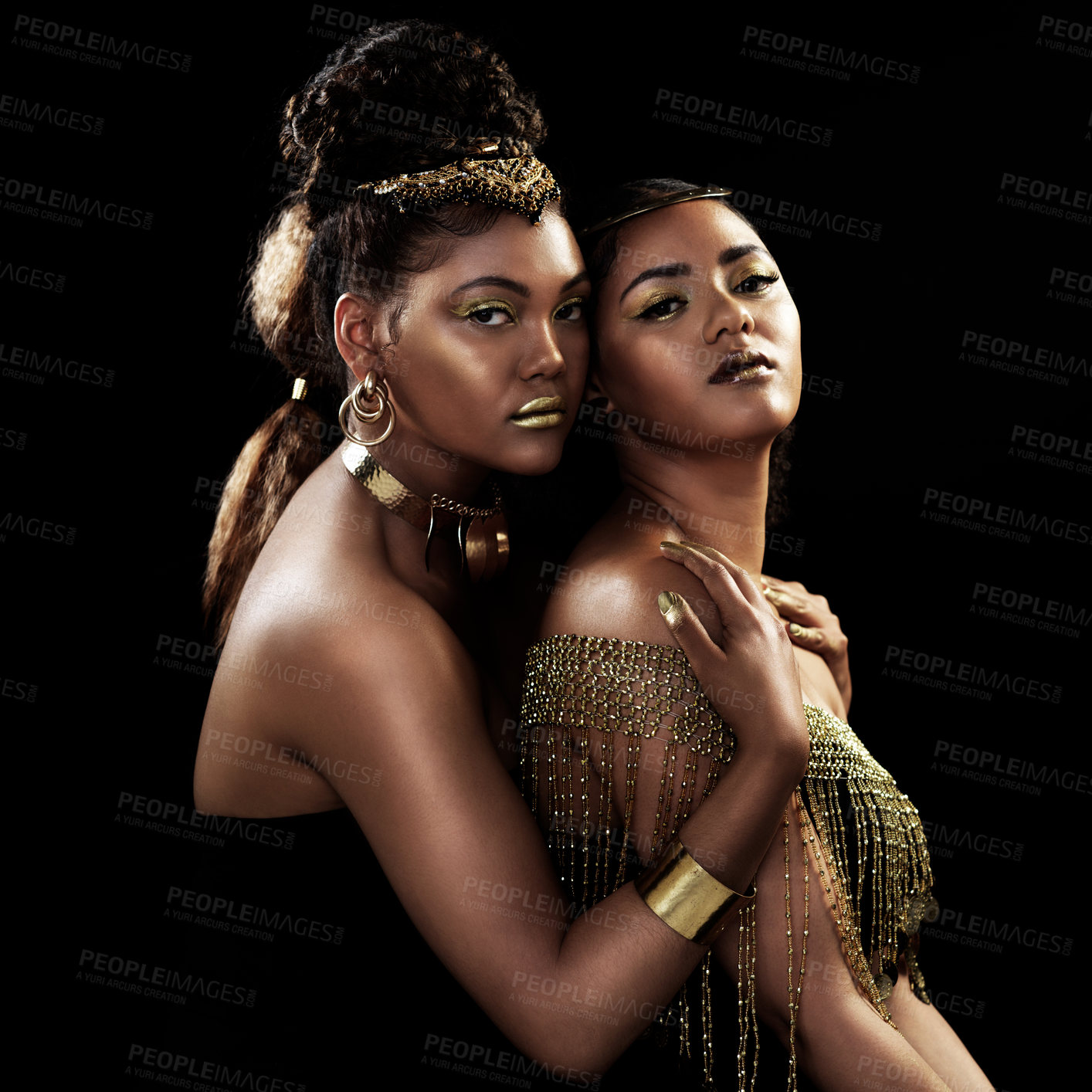 Buy stock photo Beautiful women, in gold jewellery and studio portrait with black background for luxury, glamour or elegant fashion. Sisters, royal and proud together for empowerment, cosmetics and accessories