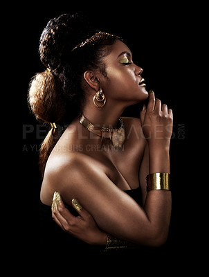 Buy stock photo Gold, profile and black woman with jewelry for luxury, fashion and rich with crown for beauty on dark background. African queen, glow and pride for culture, wealth and royalty by studio backdrop