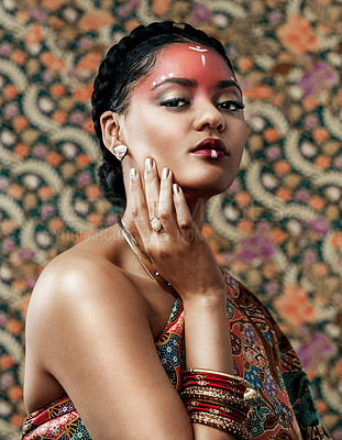Buy stock photo Africa, fashion and portrait for culture with black woman in studio on wallpaper background for tradition. Beauty, face and heritage with confident young tribal person in makeup for custom or ritual