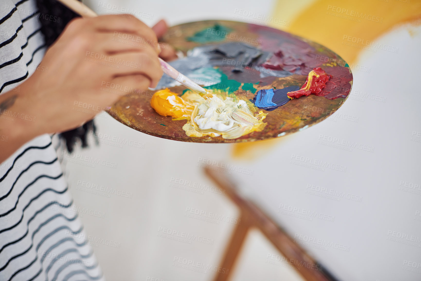 Buy stock photo Person, hands and art with palette in closeup for painting on canvas for hobby and creative vision at home. Painter, artwork and oil color mixing with brush in workshop for inspiration and expression