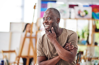 Buy stock photo Cropped shot of a middle aged man looking thoughtful in a art studio