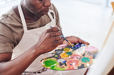 Buy stock photo Cropped shot of an unrecognizable man holding a painter's palette