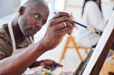 Buy stock photo Cropped shot of a middle aged man painting in a art studio