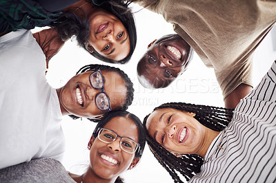 Buy stock photo Cropped shot of a group of people looking down at the camera
