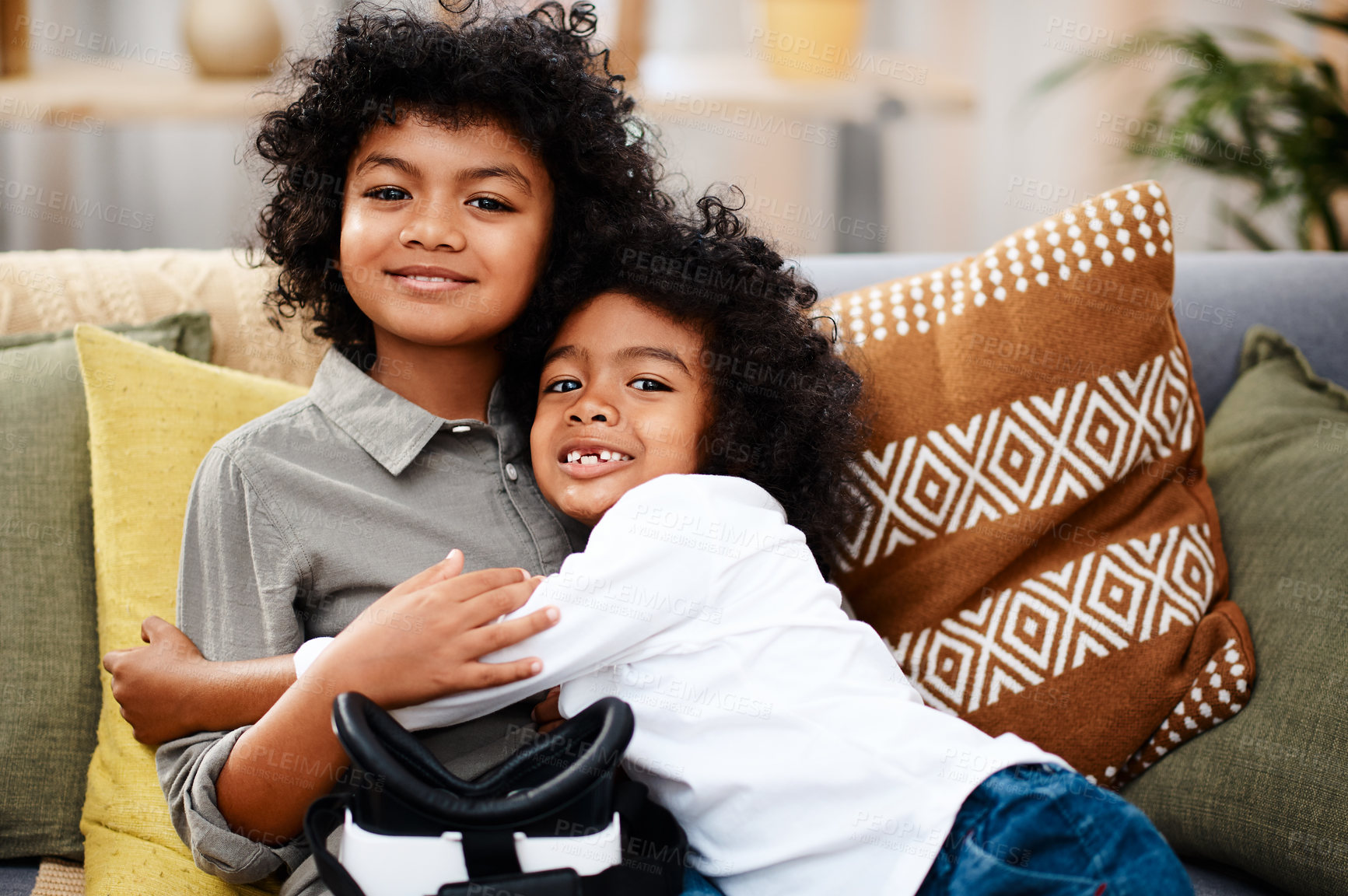 Buy stock photo Hugging, couch and brothers in living room for portrait, support and bonding in school holidays. Children, together and happiness on sofa for growth, relationship and relaxing in family home