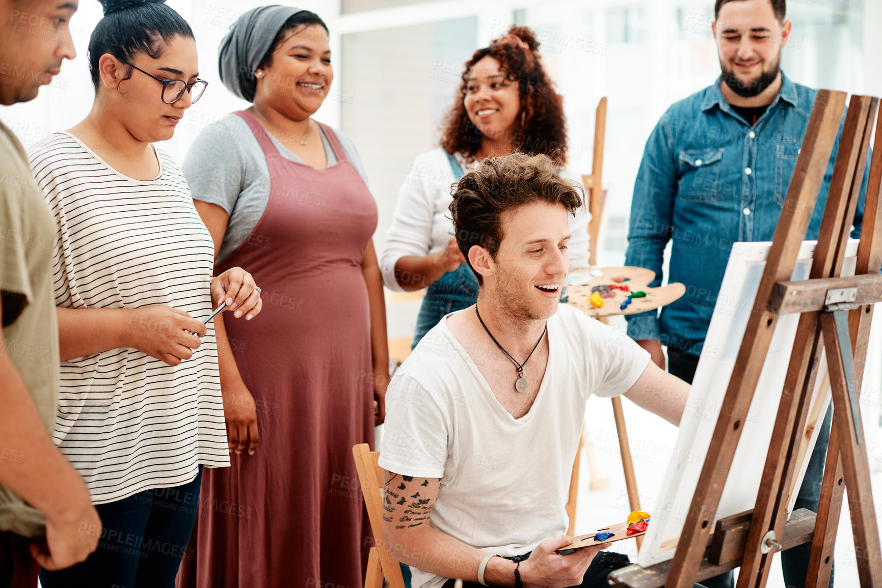 Buy stock photo Art, creative and group of painting students in studio together for education, learning or lesson. Demonstration, example or teaching and man in class or workshop with academic people for passion