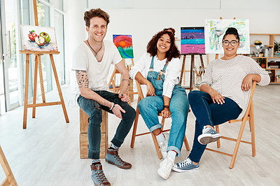Buy stock photo Cropped portrait of a diverse group of friends sitting together during an art class in the studio