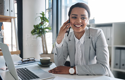 Buy stock photo Portrait of an attractive young businesswoman answering a phone call while working in her office
