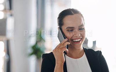 Buy stock photo Cropped shot of an attractive young businesswoman answering a phone call inside her office
