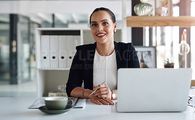 Buy stock photo Portrait of an attractive young businesswoman feeling confident and cheerful while working inside her office