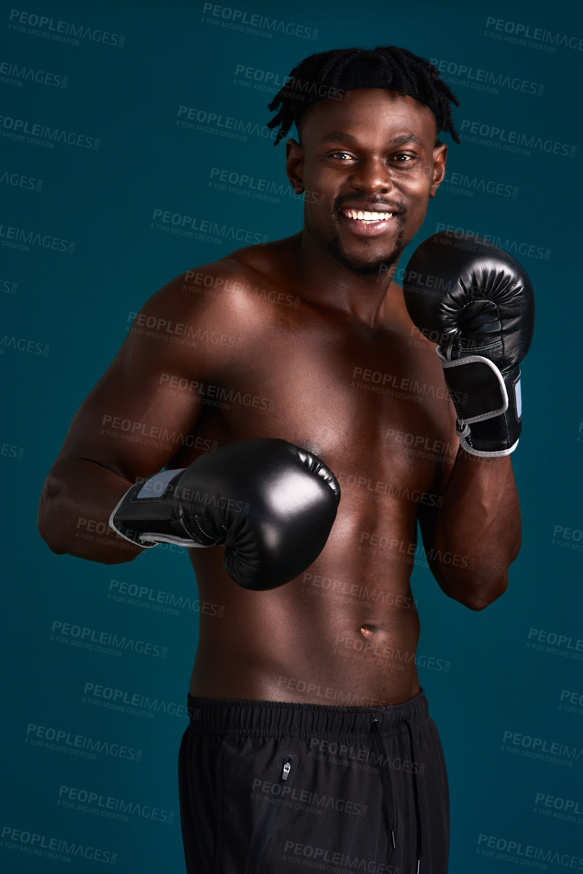 Buy stock photo Studio, black man and portrait with fist for boxer, mma workout and prepare for fight competition. Fitness, male person and boxing with gloves for training, resilience and happy by dark background