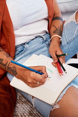 Buy stock photo Cropped shot of an unrecognizable woman drawing at home