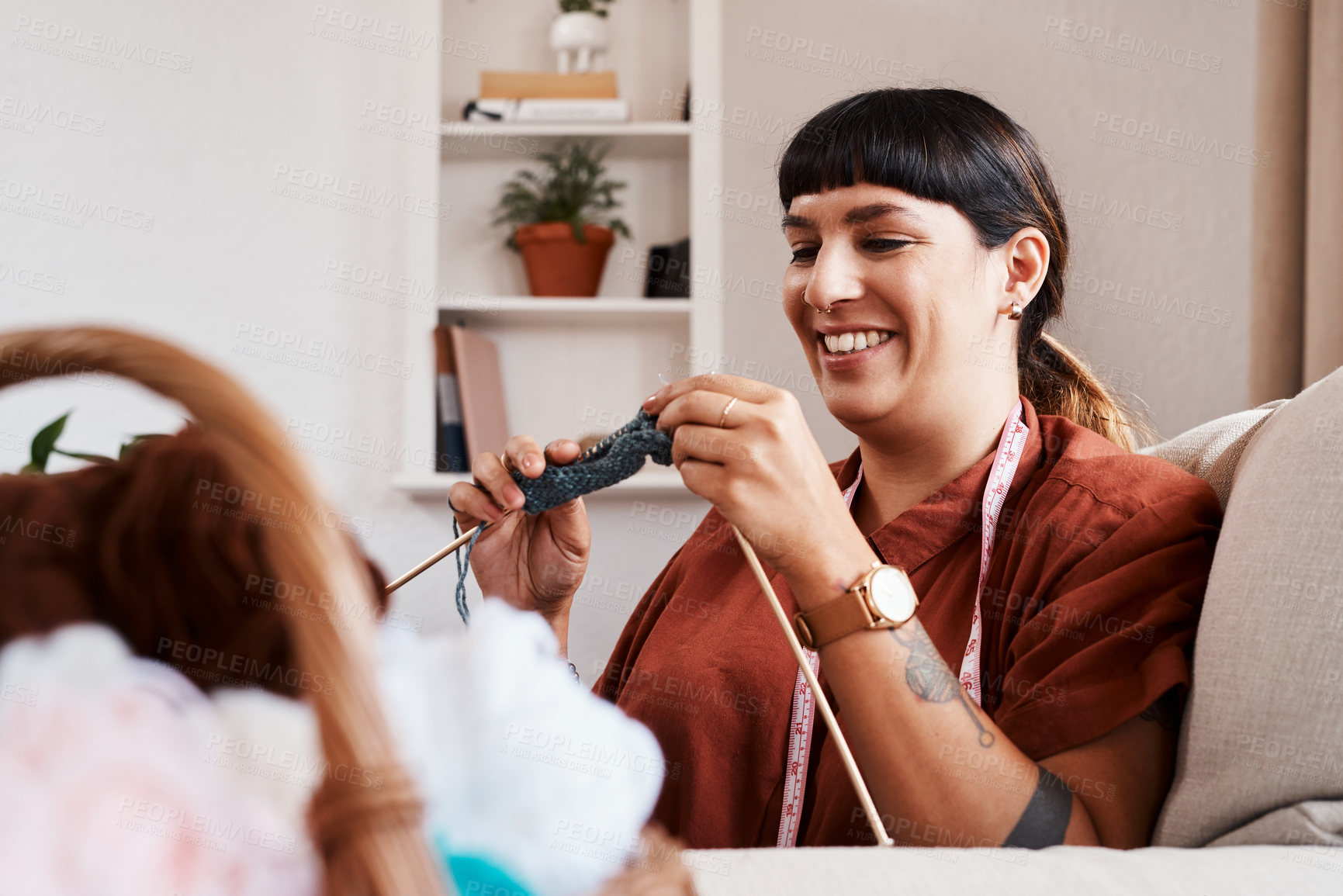 Buy stock photo Creative, knitting and girl with wool in home for stitching project on sofa with skill. Craft, needles and happy woman relax with yarn textile in apartment for calm activity or hobby on weekend