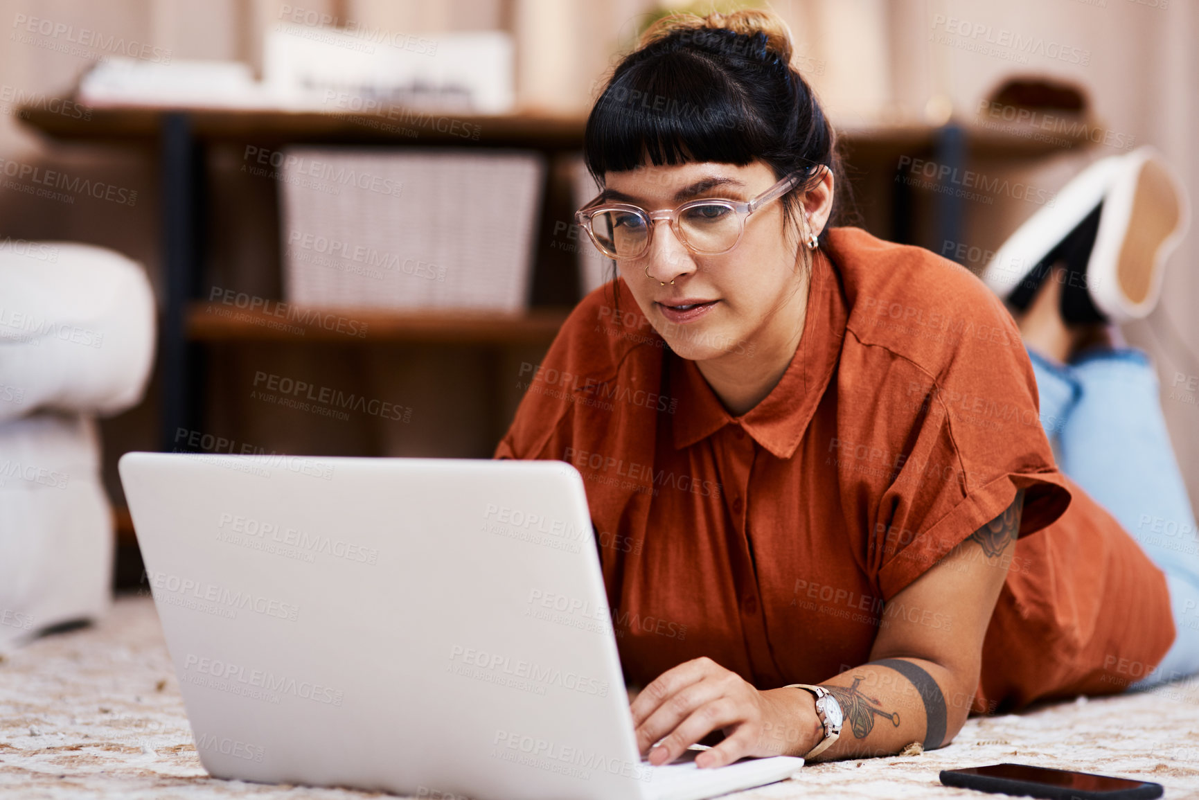 Buy stock photo Carpet, internet and woman with laptop in home for streaming movie, subscription service and relax. Computer, watching and female person on floor with online video for social media post and chat app