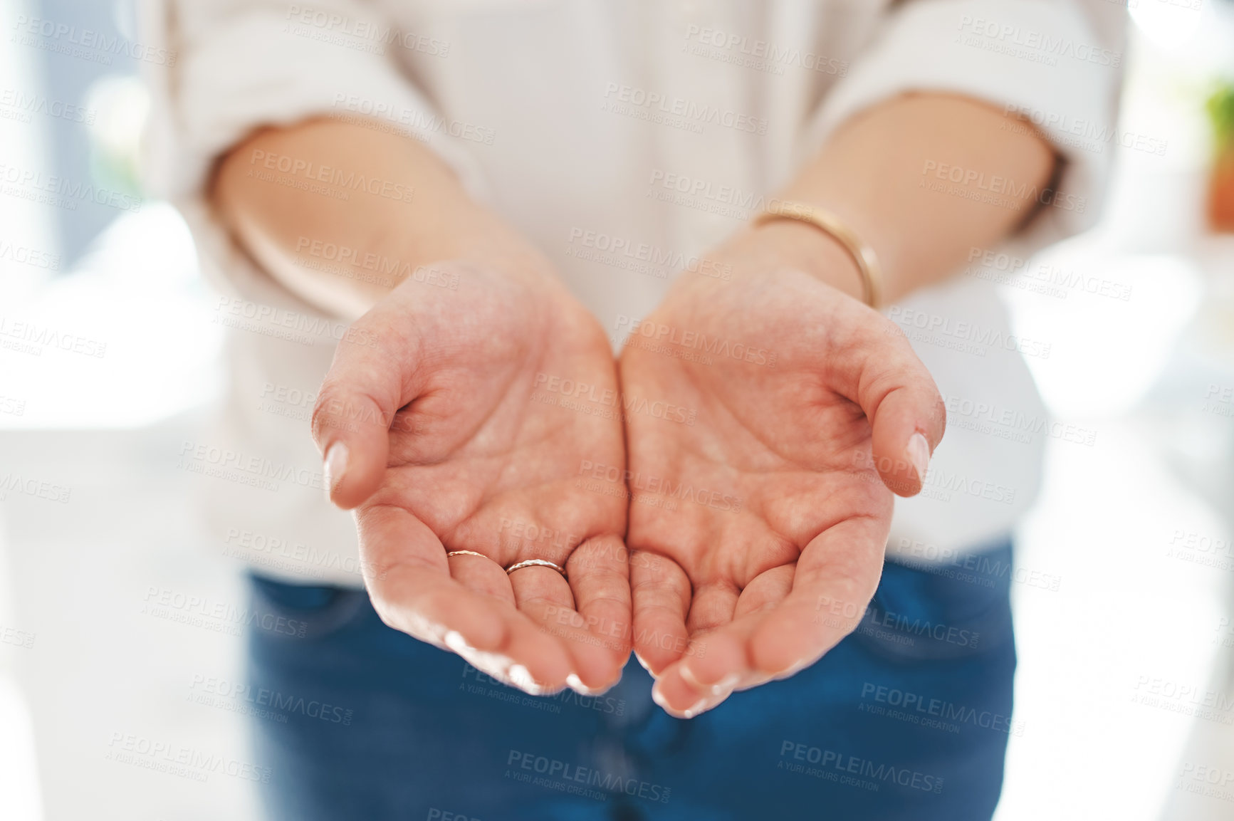 Buy stock photo Cropped shot of an unrecognizable businesswoman  posing with her hands cupped inside an office