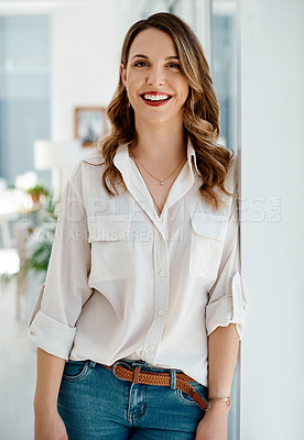 Buy stock photo Portrait of an attractive young businesswoman standing inside her office