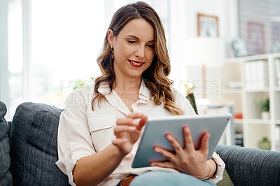 Buy stock photo Office, internet and woman with tablet on sofa for communication, company report or research. Employee, smile and female person with tech at work for administration, feedback or digital policy review