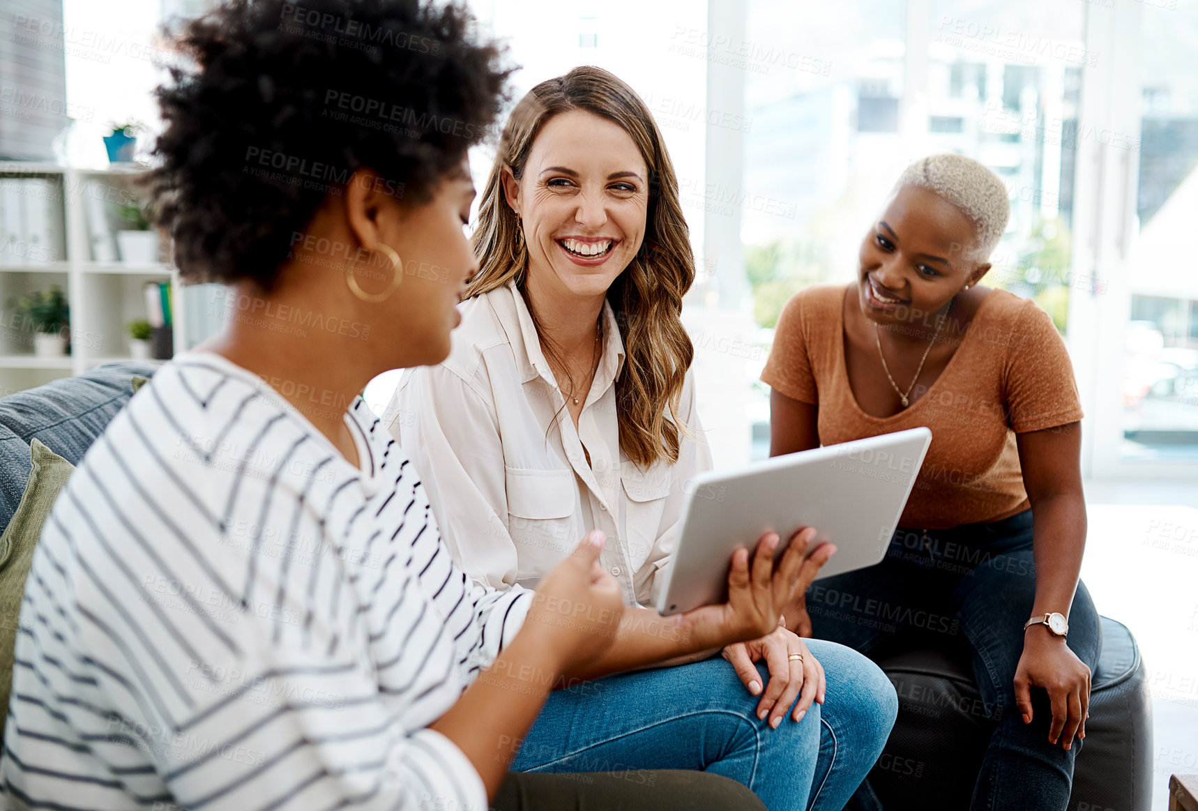 Buy stock photo Tablet, smile or happy people in startup meeting for solution, speaking and teamwork in conversation. Women, technology and designers in office for planning, talking and collaboration in workplace