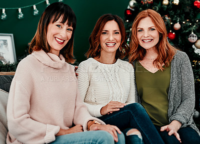 Buy stock photo Portrait, Christmas and women on sofa for happiness, season and tradition in living room. Festive, holiday and female friends on couch for celebration, xmas tree and reunion for bonding in home