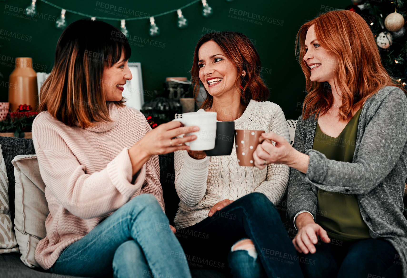 Buy stock photo Cheers, friends and women on couch with smile for celebration, holidays and reunion in home. Coffee, happiness and together in living room for vacation, connection and toast with tea in apartment