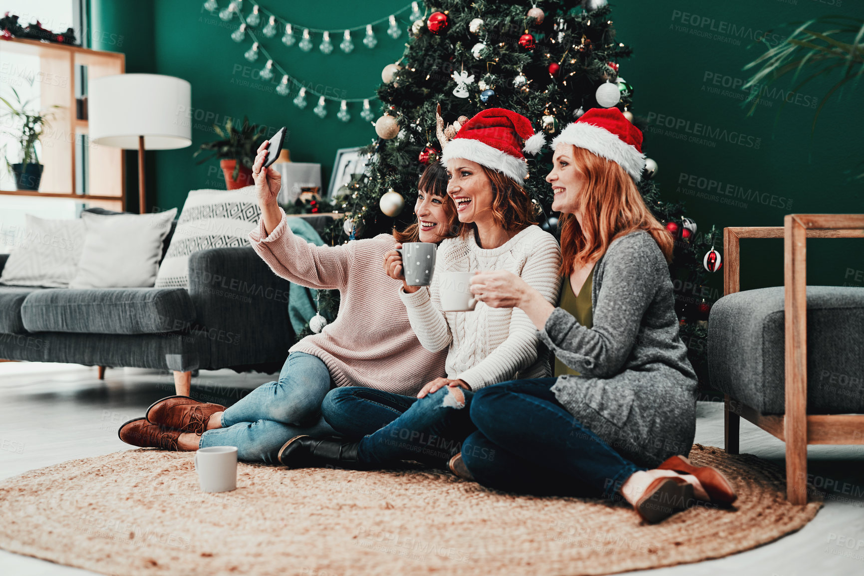 Buy stock photo Christmas cap, women selfie and friends for celebration with memory together and social media update in home. Female people, happy and festive group with video call or picture app for online gallery