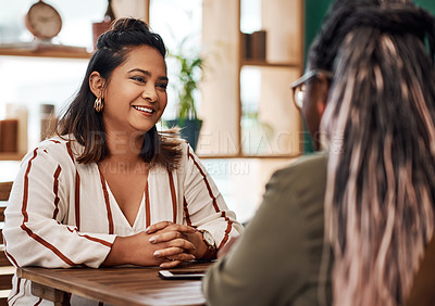 Buy stock photo Smile, woman and talking in coffee shop for communication, discussion and connection. Friends, diversity and happy together for news, gossip and information or reunion in New York cafe or restaurant