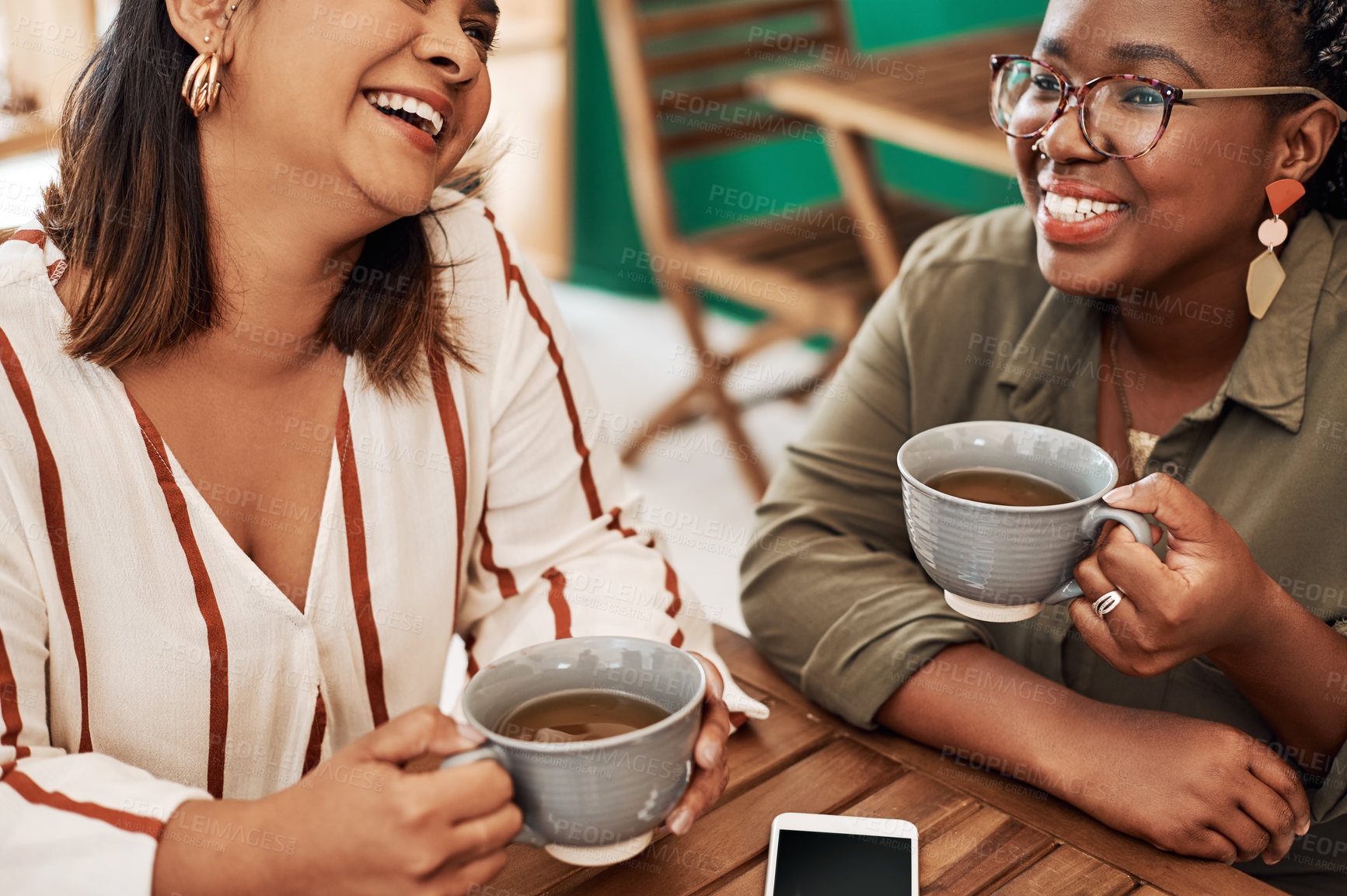 Buy stock photo Laughing, women or friends in coffee shop for talking, conversation or discussion in restaurant. Reunion, tea beverage or happy people drinking to relax in cafe for chat, funny joke or gossip