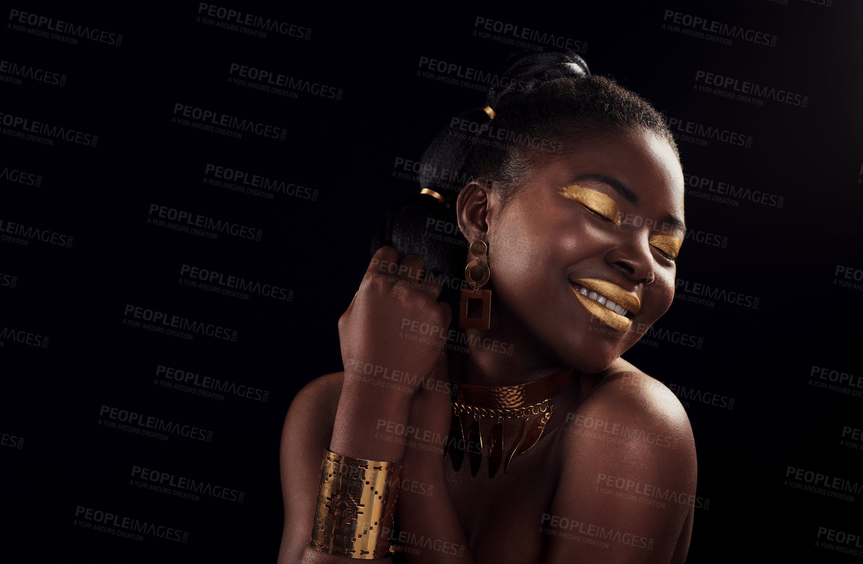 Buy stock photo Beauty, gold and black woman in studio for makeup, art and elegance against a black background. Rich, creative and African female model pose with jewelry for wealth, royal and luxury queen aesthetic