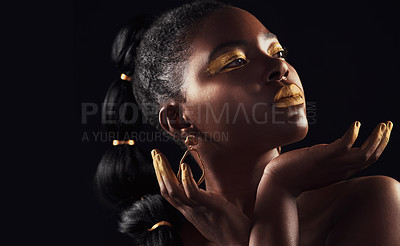 Buy stock photo Makeup, glitter and black woman in studio for beauty, luxury and body care on black background, Gold, art and African female model with wealth, glow and jewellery, elegance and posing royal aesthetic