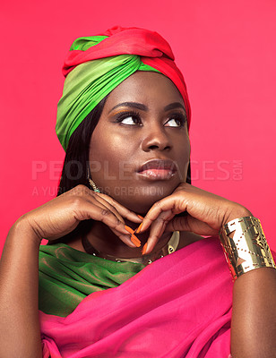 Buy stock photo Thinking, beauty and black woman with fashion in studio with traditional and classy outfit with jewelry. Makeup, ideas and Nigerian female model with elegant style and accessories by pink background.