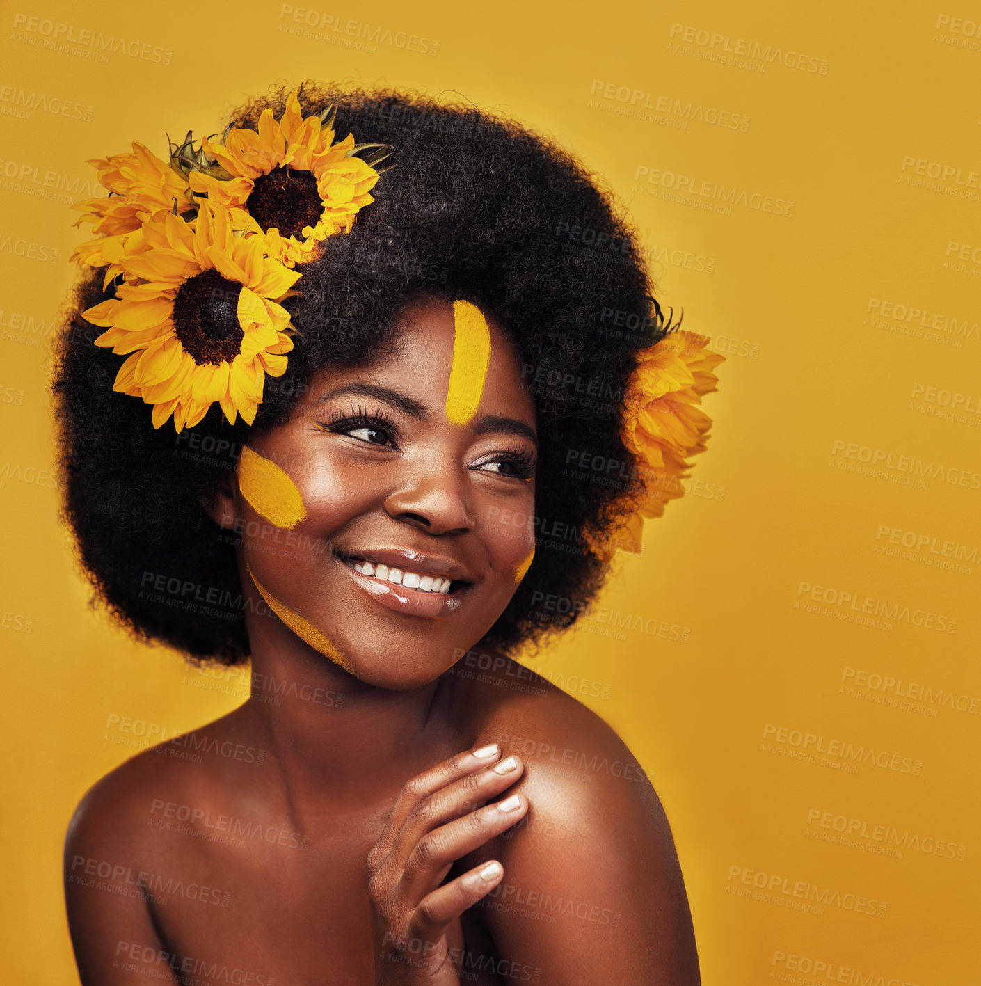 Buy stock photo Black person, beauty and sunflower with skincare in studio for natural glow, cosmetics or soft skin. Woman, plant and confident with smile for organic, dermatology and vitamin e on yellow background