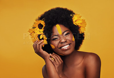 Buy stock photo Makeup, sunflower and portrait of black woman in studio for beauty, creative or spring. Natural, cosmetics and floral with face of model isolated on yellow background for art, self love or confidence