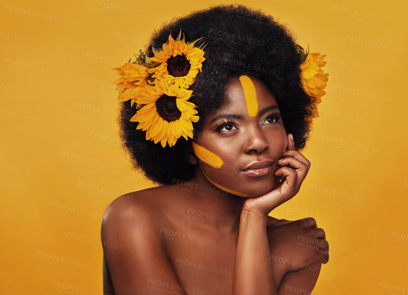 Buy stock photo Beauty, sunflower and black woman thinking in studio for makeup, wellness and treatment on yellow background. Flower, skincare and African female model relax, pose or contemplate natural cosmetics