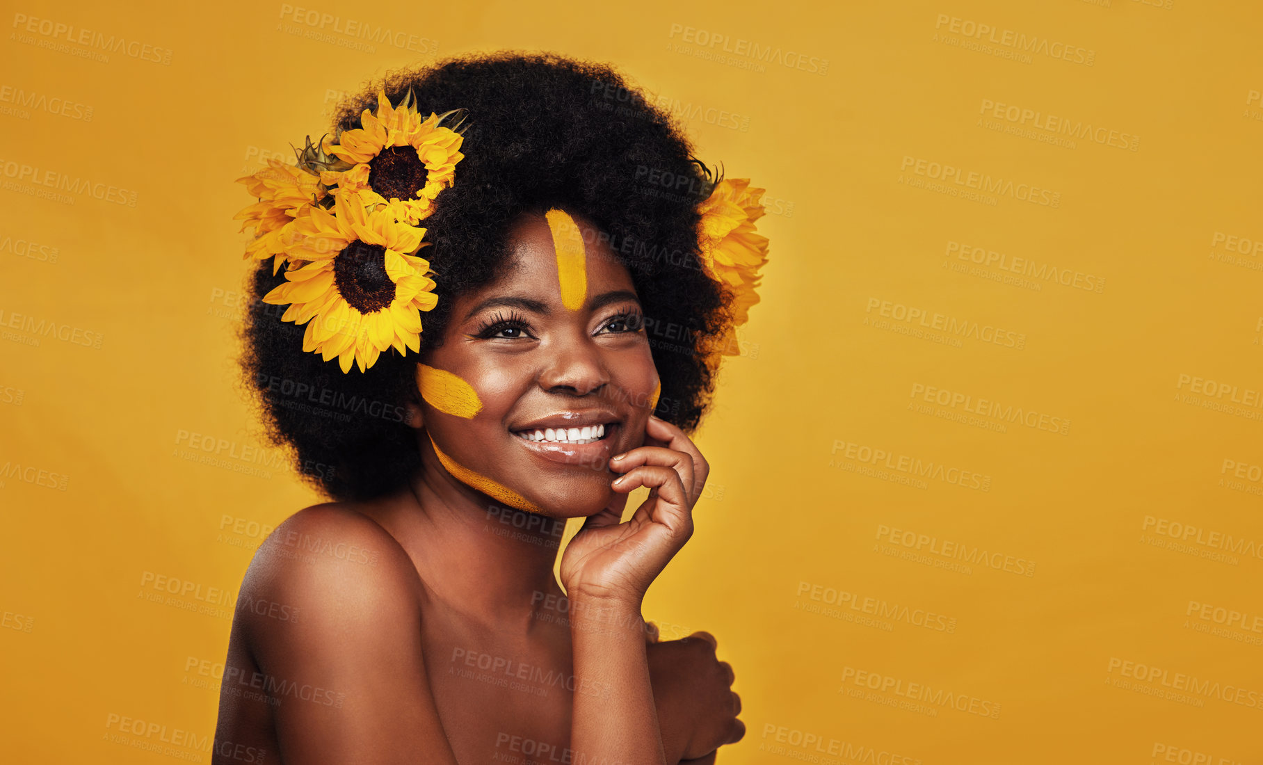 Buy stock photo Sunflower, beauty and happy black woman in studio for makeup, wellness and treatment on yellow background. Flower, skincare and African female model smile, relax and pose with natural skin cosmetics