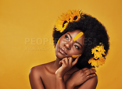 Buy stock photo Makeup, sunflower and black woman thinking in studio for beauty, wellness and treatment on yellow background. Flower, skincare and African female model relax while contemplating eco friendly cosmetic