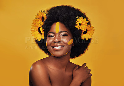 Buy stock photo Makeup, sunflower and happy with portrait of black woman in studio for beauty, creative or spring. Natural, cosmetics and floral with face of model on yellow background for art, self love or glow