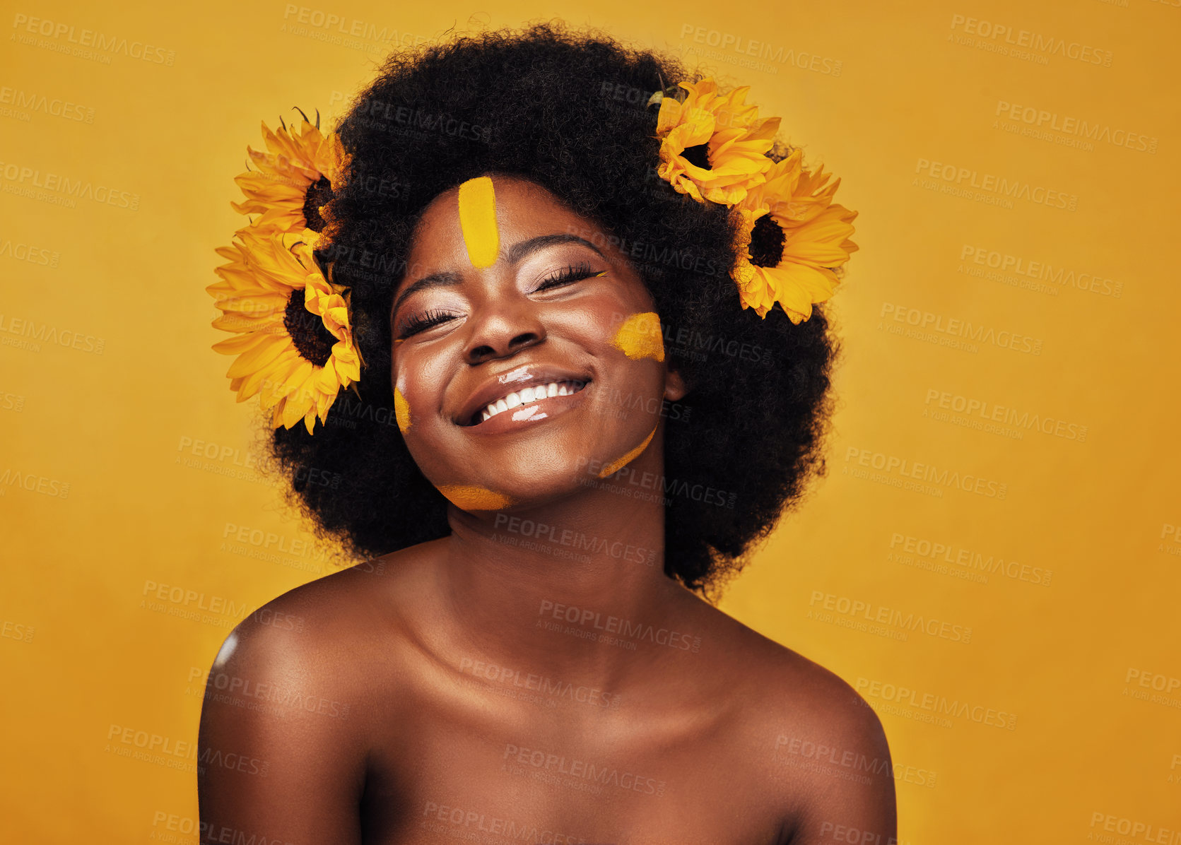 Buy stock photo Black woman, sunflower and paint in studio with makeup for beauty with creative, confidence and spring. Cosmetics, yellow background and self love with natural for floral face with smile for skincare