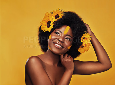 Buy stock photo Woman, studio and thought with hands and sunflowers for idea, planning or vision with afro. African female and thinking on mustard backdrop with makeup, natural beauty or skincare with sustainability