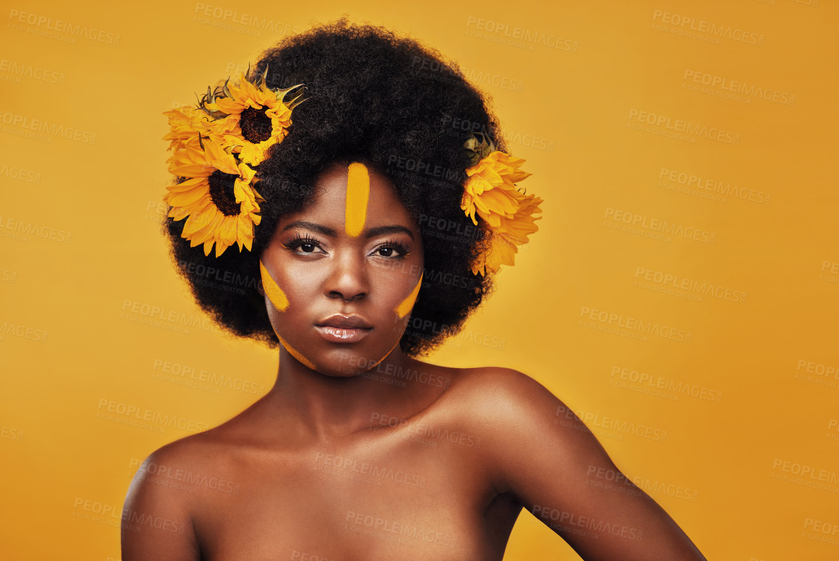 Buy stock photo Makeup, sunflower and paint with portrait of black woman in studio for beauty, creative or spring. Natural, cosmetics and floral with face of model on yellow background for art, self love or glow
