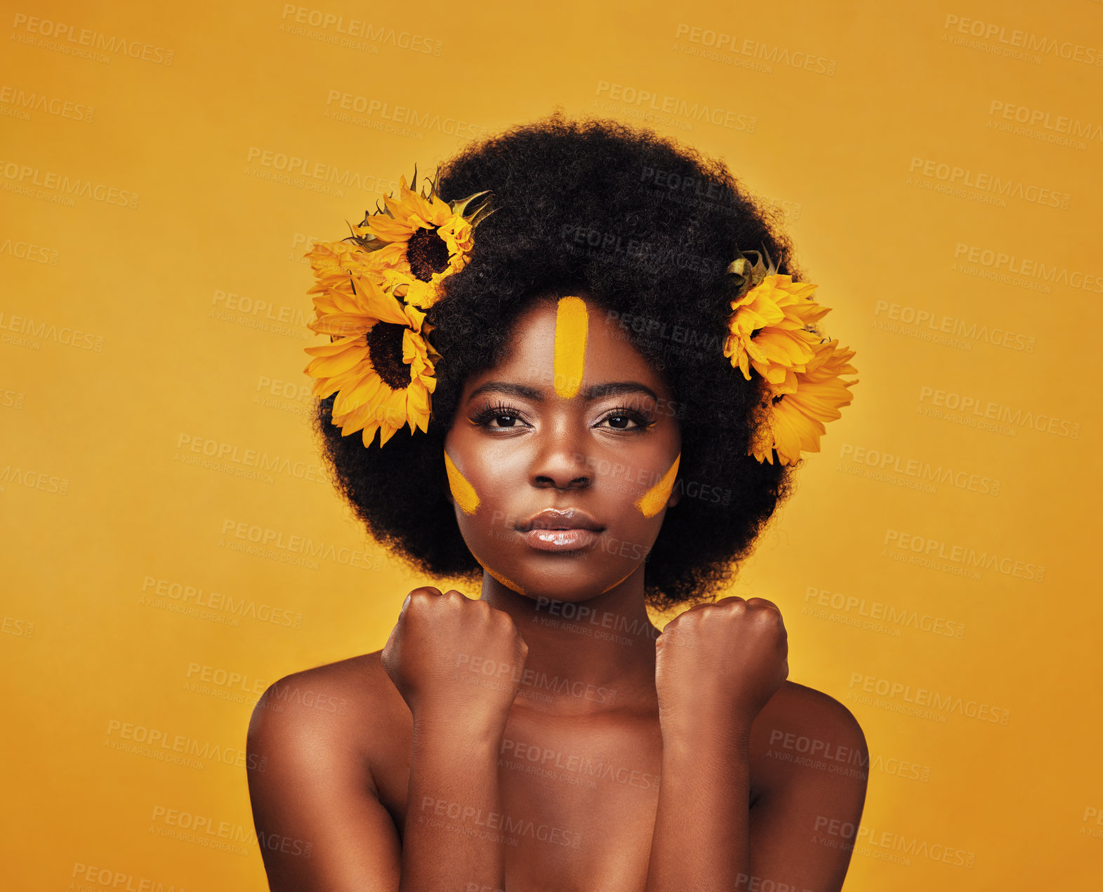 Buy stock photo Makeup, sunflower and hair with portrait of black woman in studio for beauty, creative or spring. Natural, cosmetics and floral with face of model on yellow background for art, self love or glow