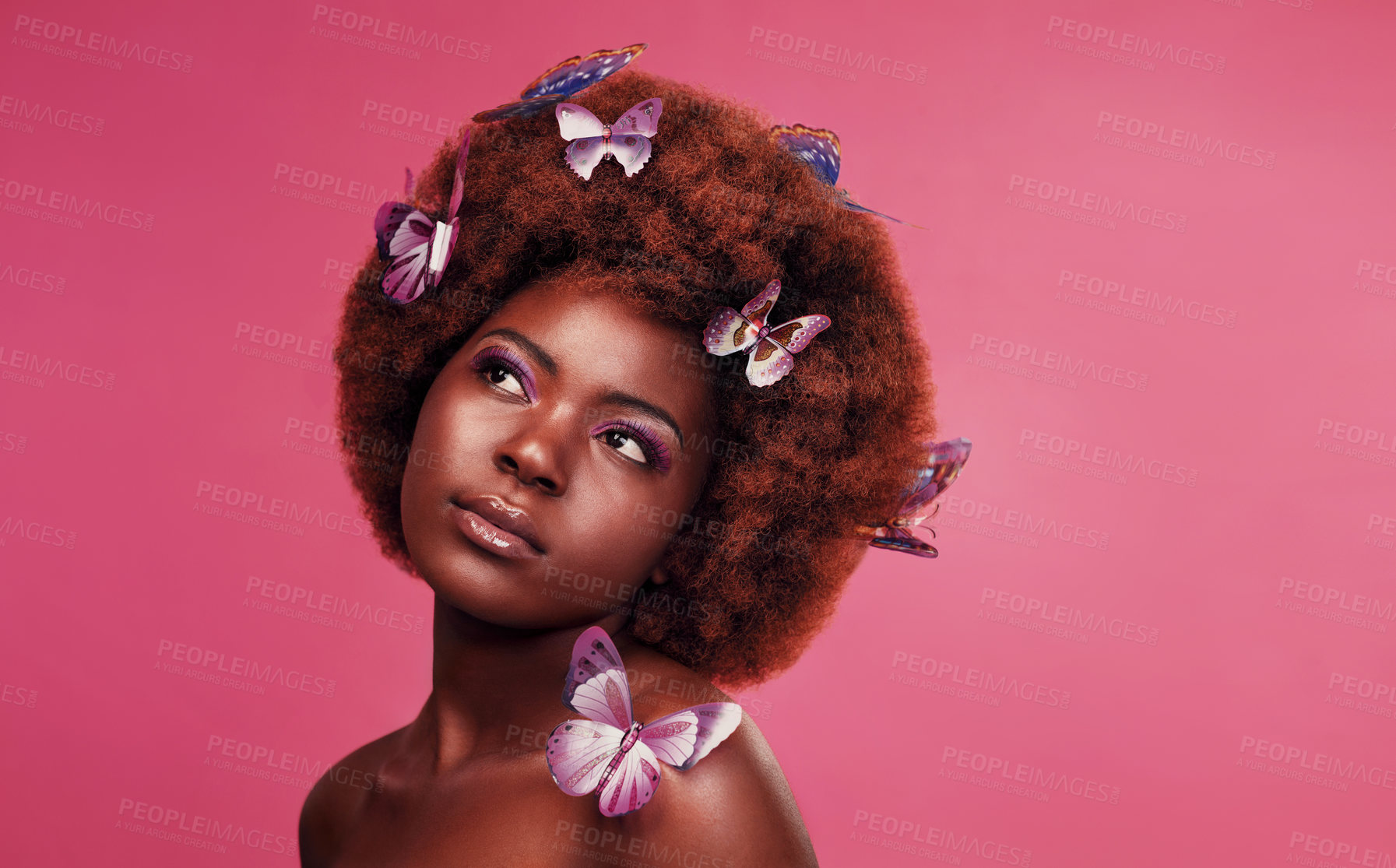 Buy stock photo Beauty, makeup and black woman with butterflies in studio with creative, art and fantasy. Cosmetics, thinking and female model from Nigeria with insects for facial cosmetology by pink background.